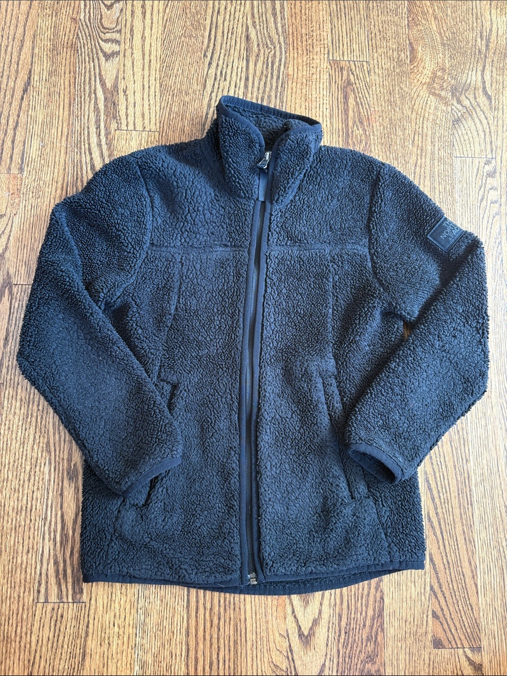 The North Face girls’ black Campshire full zip sherpa fleece jacket, size 7/8